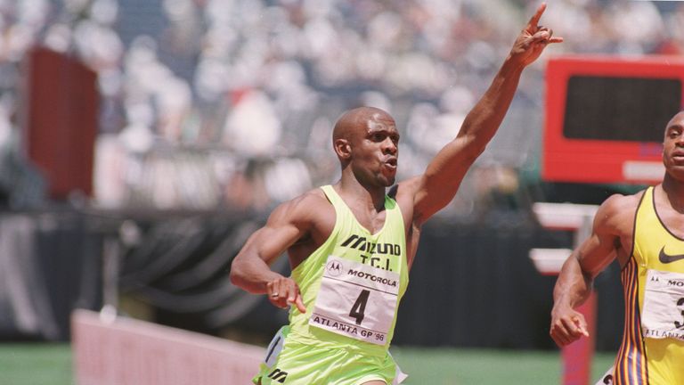 18 May 1996:  Sprinter Dennis Mitchell of the USA raises his hand in celebration as he crosses the finish line first to win the men''s 100m event at the IA