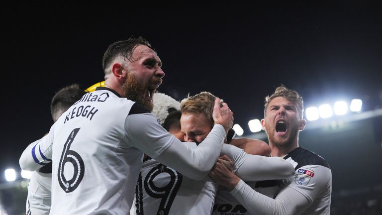 DERBY, ENGLAND - DECEMBER 02: Richard Keogh (L) and Sam Winnall (R) of Derby County celebrates with Johnny Russell after he scores the winning goal during 