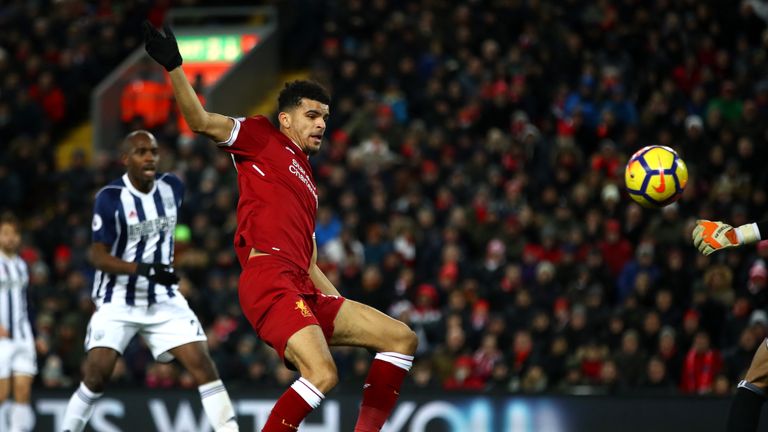 LIVERPOOL, ENGLAND - DECEMBER 13: Dominic Solanke of Liverpool shoots during the Premier League match between Liverpool and West Bromwich Albion at Anfield