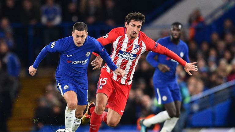 Chelsea's Belgian midfielder Eden Hazard (L) vies with Atletico Madrid's Montenegrin defender Stefan Savic during a UEFA Champions League Group C football 