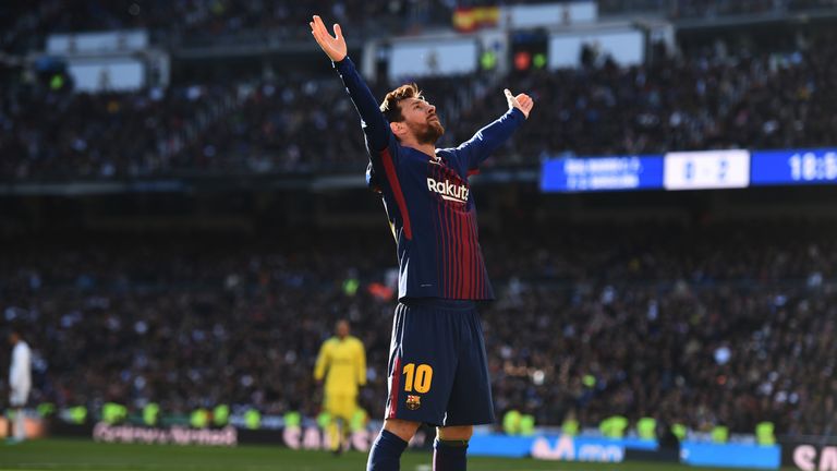 Lionel Messi celebrates after doubling Barcelona's lead from the penalty spot