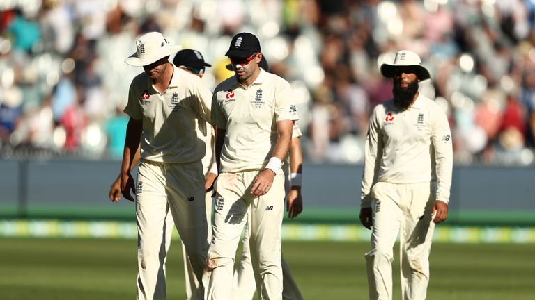 MELBOURNE, AUSTRALIA - DECEMBER 26:  Stuart Broad and James Anderson of England walk from tge ground at stumps during day one of the Fourth Test Match in t