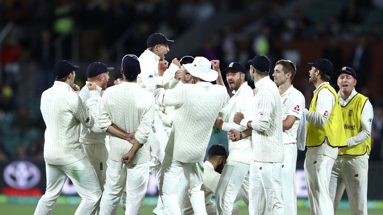Joe Root of England celebrates after Chris Woakes of England took the wicket of Steve Smith of Australia
