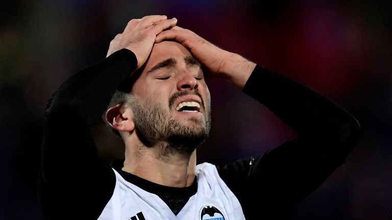 Valencia's Spanish defender Jose Luis Gaya Pena reacts after missing a goal opportunity during the Spanish league football match Getafe CF vs Valencia CF a