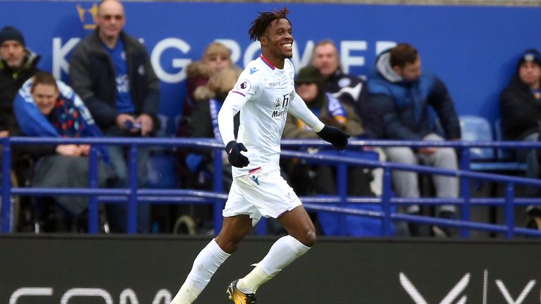 Wilfried Zaha celebrates his goal during the Premier League match at the King Power Stadium