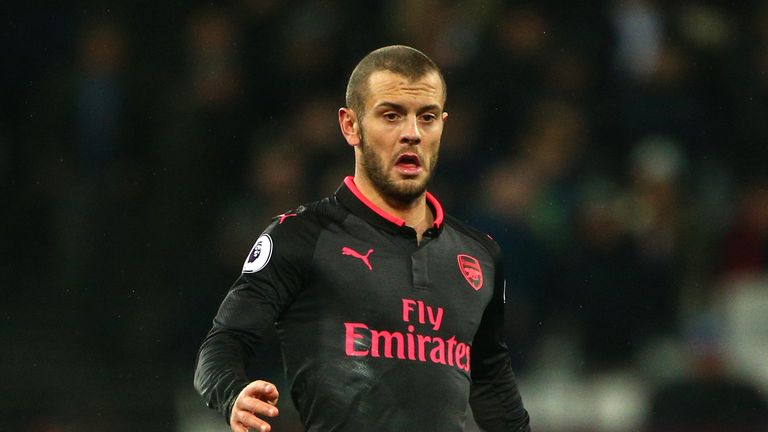 LONDON, ENGLAND - DECEMBER 13: Jack Wilshere of Arsenal runs with the ball during the Premier League match between West Ham United and Arsenal at London St