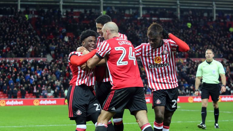 Josh Maja (L) celebrates with team-mates after scoring the only goal of the game