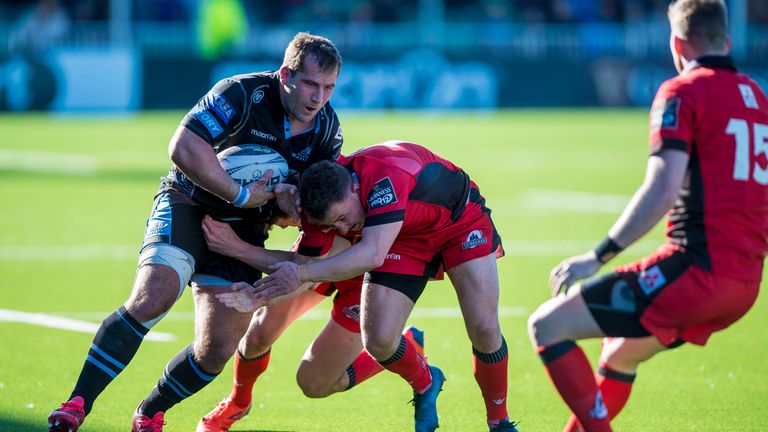 Glasgow Warriors vs Edinburgh.Edinburgh's Blair Kinghorn and Duncan Weir are pushed aside by Fraser Brown