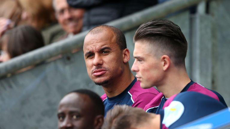 Gabriel Agbonlahor and Jack Grealish speak during the Sky Bet Championship match between Blackburn Rovers and Aston Villa at Ewood Park on April 29, 2017