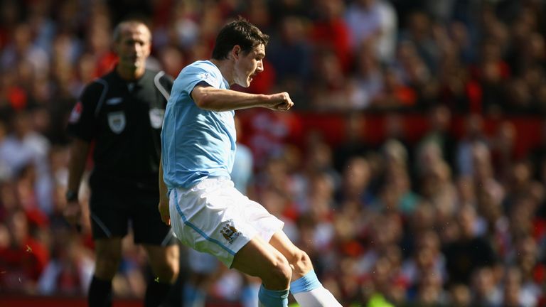 MANCHESTER, ENGLAND - SEPTEMBER 20:  Gareth Barry of Manchester City scores his team's first goal during the Barclays Premier League match between Manchest