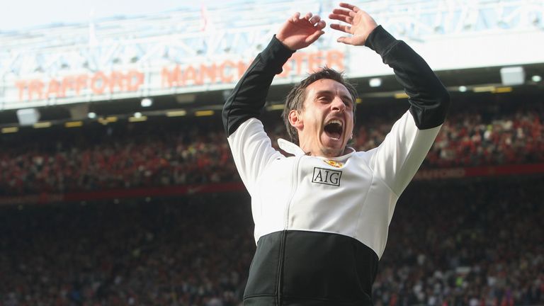 Gary Neville celebrates in the Premier League match between Manchester United and Manchester City at Old Trafford