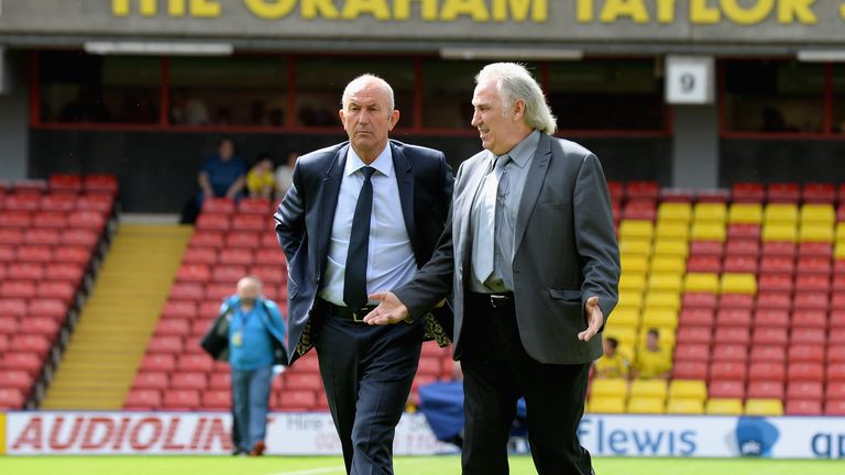 WATFORD, ENGLAND - AUGUST 15: Tony Pulis, Manager of West Bromwich Albion talking to Gerry Francis during the Barclays Premier League match between Watford