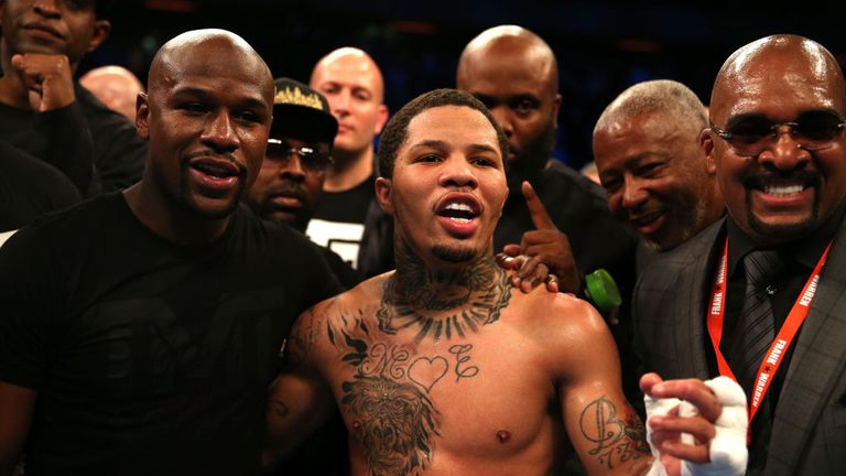 Gervonta Davis of The United States celebrates with Floyd Mayweather following victory against Liam Walsh of England