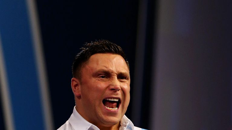 Gerwyn Price celebrates winning his match ong day nine of the William Hill World Darts Championship