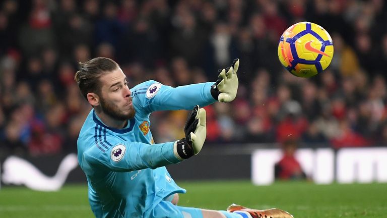 LONDON, ENGLAND - DECEMBER 02: David De Gea of Manchester United makes a save during the Premier League match between Arsenal and Manchester United at Emir