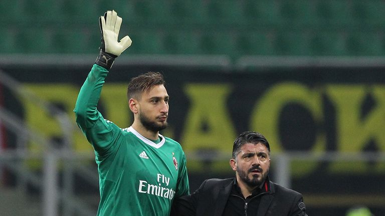 MILAN, ITALY - DECEMBER 13:  Gianluigi Donnarumma of AC Milan and AC Milan coach Gennaro Gattuso salute the crowd at the end of the Tim Cup match between A