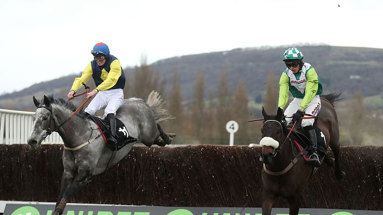 Guitar Pete (left) ridden by Ryan Day jumps the last to win the Caspian Caviar Gold Cup Handicap Steeple Chase during day two of The International meeting 