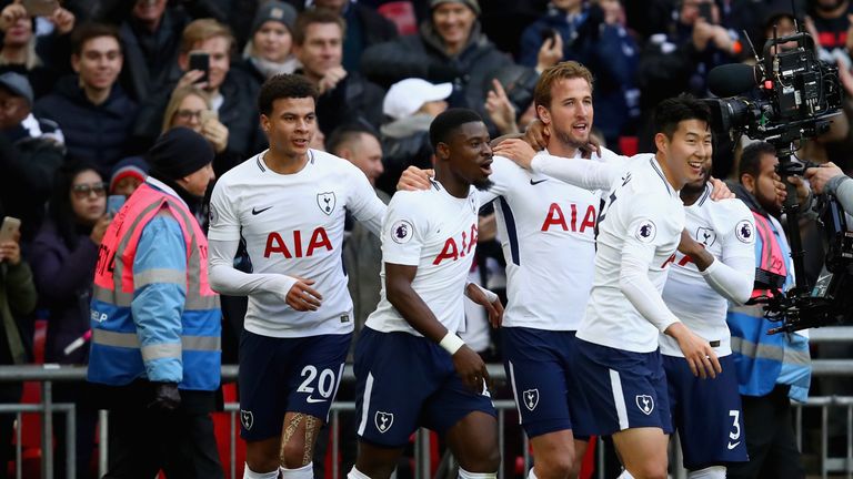 LONDON, ENGLAND - DECEMBER 26: Harry Kane of Tottenham Hotspur celebrates after scoring his sides first goal with his team mates during the Premier League 