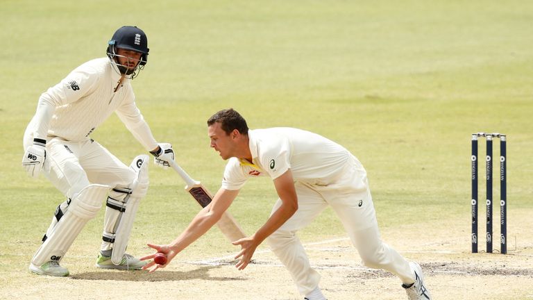 PERTH, AUSTRALIA - DECEMBER 17: Josh Hazlewood of Australia takes a catch of his bowling to dismiss Alistair Cook of England during day four of the Third T