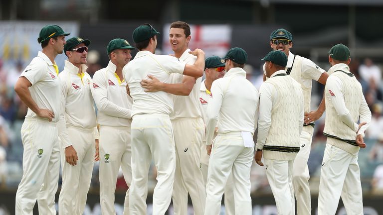 PERTH, AUSTRALIA - DECEMBER 18:  Josh Hazlewood of Australia celebrates after taking the wicket of  Jonny Bairstow of England during day five of the Third 