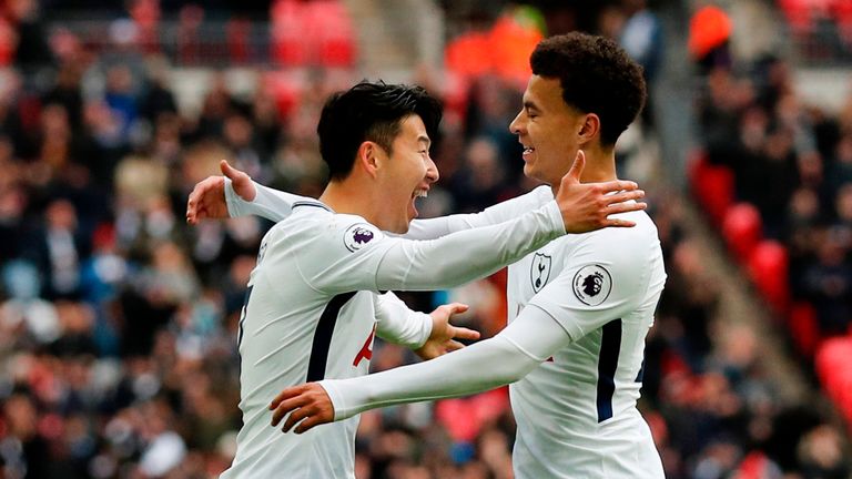 Heung-Min celebrates with Dele Alli after scoring Tottenham's fourth