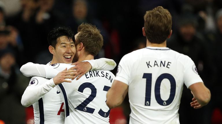 Heung-Min Son celebrates with team-mates after doubling Tottenham's lead
