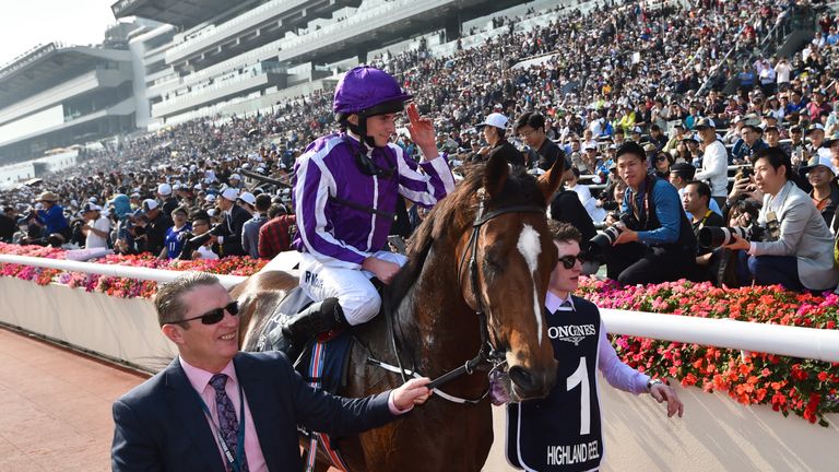HONG KONG - DECEMBER 10:  Ryan Moore riding Highland Reel after winning Race 4, The Longines Hong Kong Vase during Longines Hong Kong International Race Da