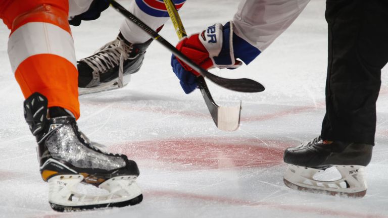 Players line up for a puck drop