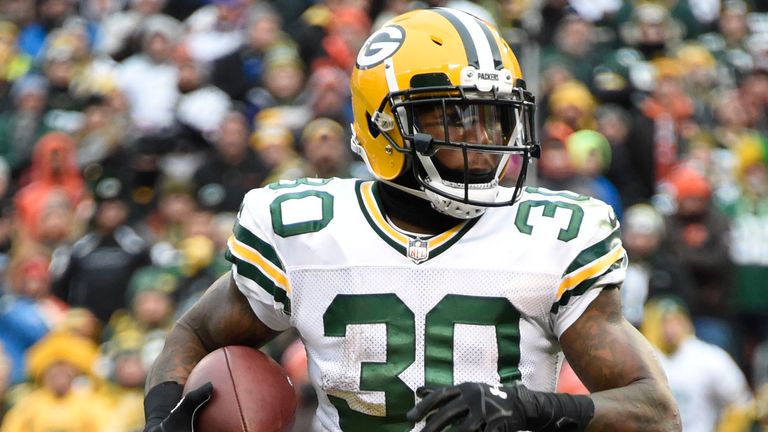 CLEVELAND, OH - DECEMBER 10: Jamaal Williams #30 of the Green Bay Packers runs the ball in for a touchdown in the fourth quarter against the Cleveland Brow