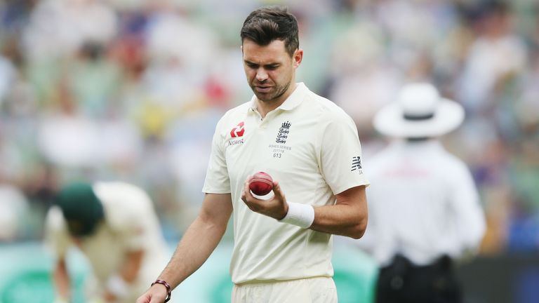 James Anderson of England is given the ball from  Joe Root after he shines it during day four of the Fourth Test Match