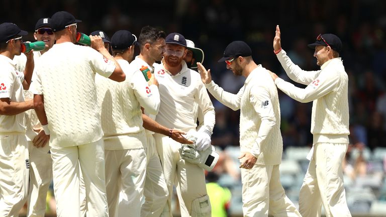 James Anderson of England celebrates after taking the wicket of Steve Smith of Australia  during day four of the Third Test