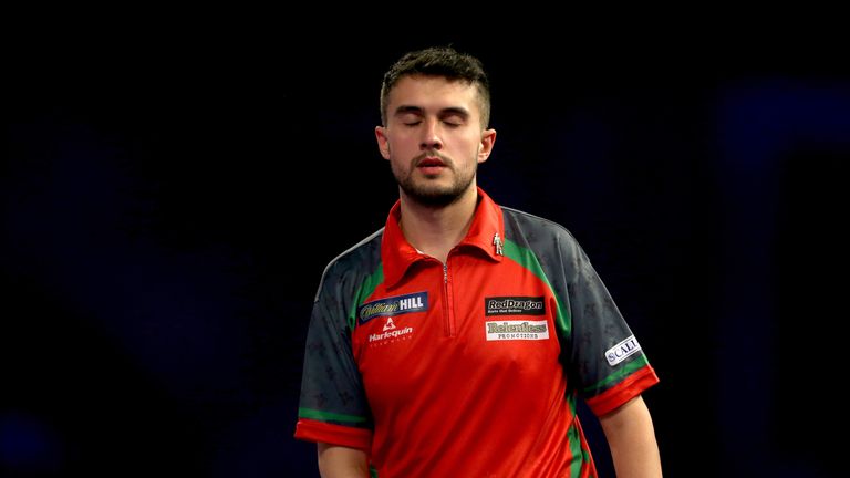 Jamie Lewis reacts during his World Championship semi-final defeat to Phil Taylor
