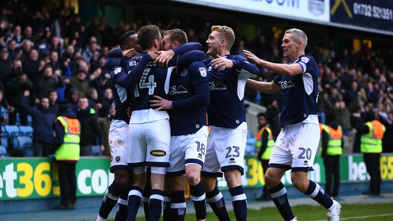 LONDON, ENGLAND - DECEMBER 16:  Jed Wallace of Millwall celebrates with his teammates after scoring his sides first goal during the Sky Bet Championship ma