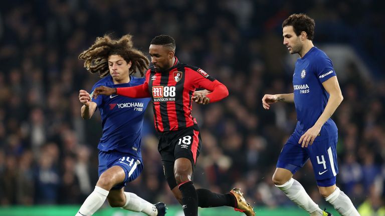 Ethan Ampadu battles for possession with Jermain Defoe