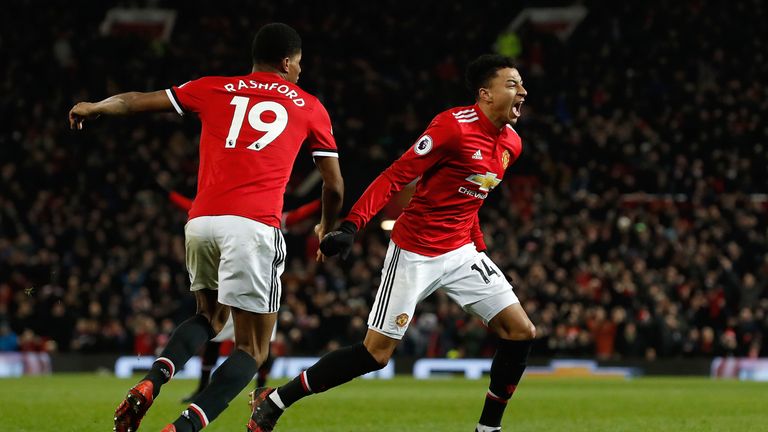 Manchester United's Jesse Lingard (right) celebrates scoring his side's second goal during the Premier League match at Old Trafford, Manchester.