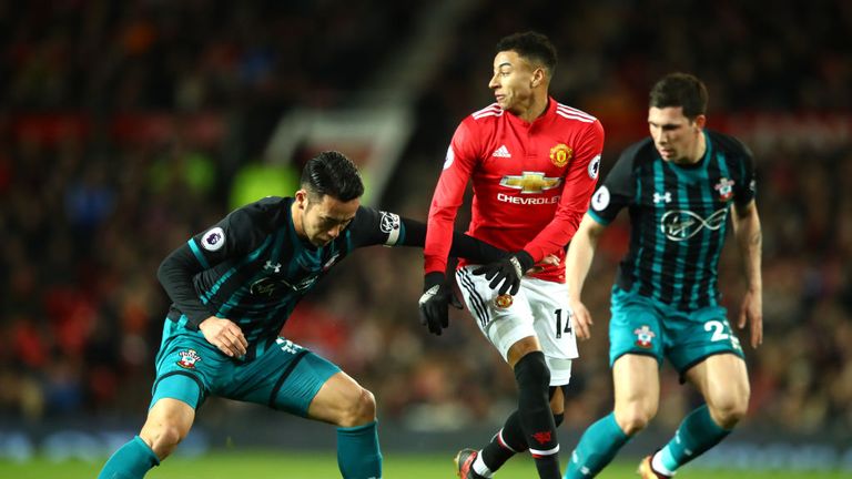 MANCHESTER, ENGLAND - DECEMBER 30:  Jesse Lingard of Manchester United battles with Maya Yoshida and Pierre-Emile Hojbjerg of Southampton during the Premie