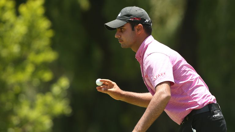 JOHANNESBURG, SOUTH AFRICA - DECEMBER 10: Shubankar Sharma of India acknowledges the crowd on the 2nd hole during the forth day of the Joburg Open at Randp