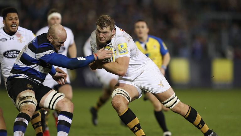 Joe Launchbury takes on Bath's  Matt Garvey 