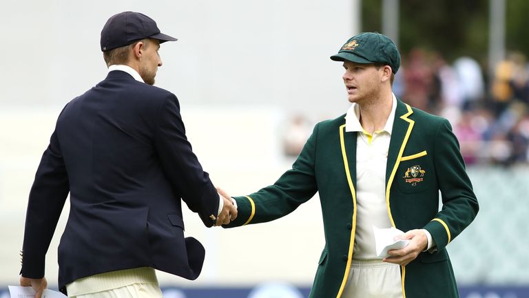 Joe Root of England shakes hands with Steve Smith of Australia during day one of the Second Test