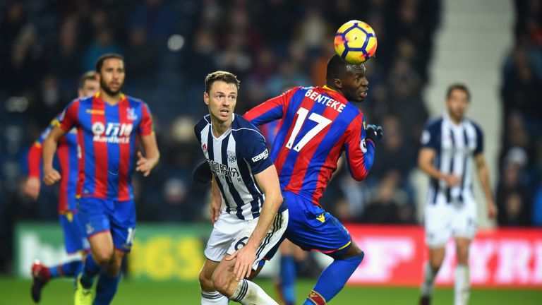Jonny Evans of West Bromwich Albion challenges Christian Benteke of Crystal Palace for the ball
