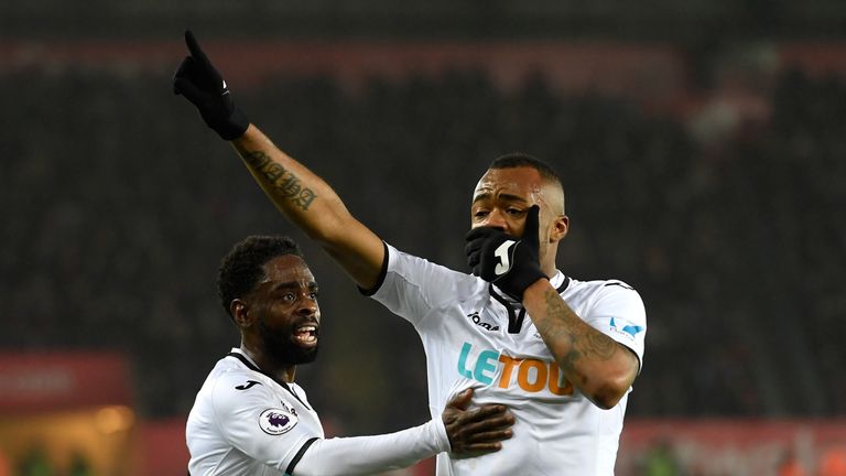 SWANSEA, WALES - DECEMBER 23:  Jordan Ayew of Swansea City celebrates after scoring his sides first goal during the Premier League match between Swansea Ci
