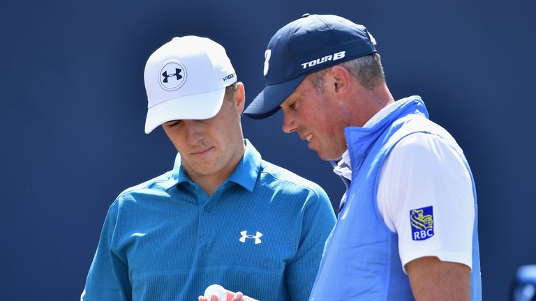 SOUTHPORT, ENGLAND - JULY 23:  Jordan Spieth of the United States and Matt Kuchar of the United States check the markings on their golf balls on the 1st te