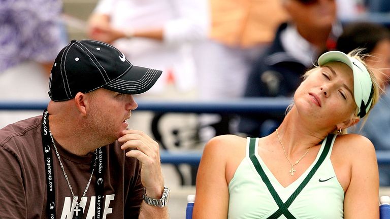 TORONTO, ON - AUGUST 23:  Maria Sharapova of Russia confers with her coach Michale Joyce between sets against Elena Dementieva of Russia during the final o