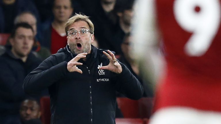 Jurgen Klopp gestures during the Premier League match between Arsenal and Liverpool at the Emirates Stadium