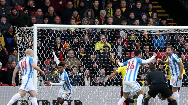 WATFORD, ENGLAND - DECEMBER 16: Elias Kachunga of Huddersfield Town celebrates after scoring his sides first goal during the Premier League match between W