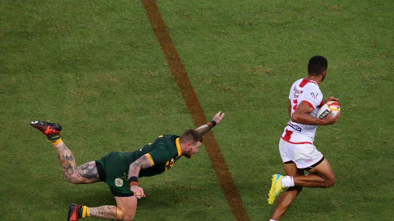 BRISBANE - DECEMBER 02 2017:  Kallum Watkins of England evades the tackle of Josh Dugan of Australia during the 2017 Rugby League World Cup Final