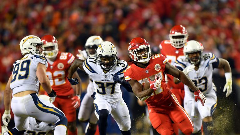 KANSAS CITY, MO - DECEMBER 16:  Running back Kareem Hunt #27 of the Kansas City Chiefs carries the ball during the game against the Los Angeles Chargers at