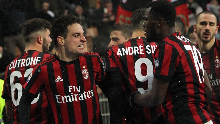 Giacomo Bonaventura (L) of AC Milan celebrates his second goal with his team-mate Franck Kessie (R) 