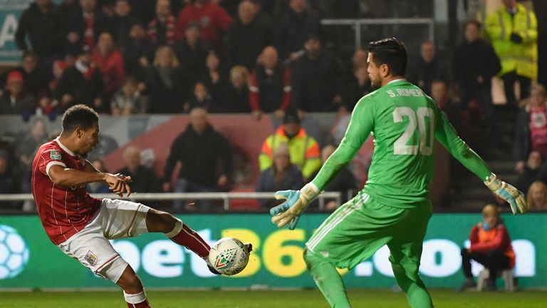 Korey Smith of Bristol City scores his sides second goal past Sergio Romero of Manchester United during the Carabao Cup quarter finals