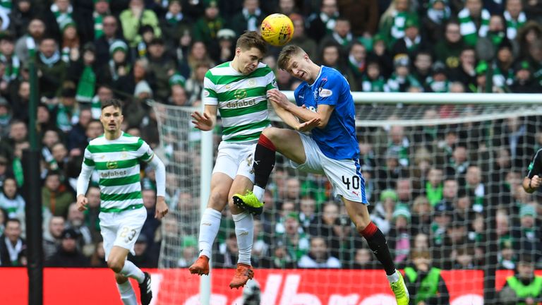 Celtic's James Forrest and Rangers' Ross McCrorie in action